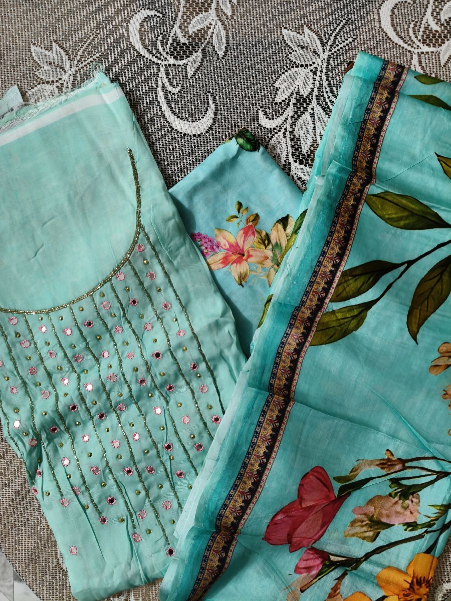 হাফ-সিল্ক কামিজে কারচুপির কাজ। Karchupi work on Half-silk kameez.