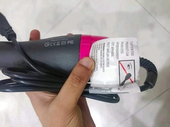 A 3-in-1 One Step Hair Dryer Brush 3